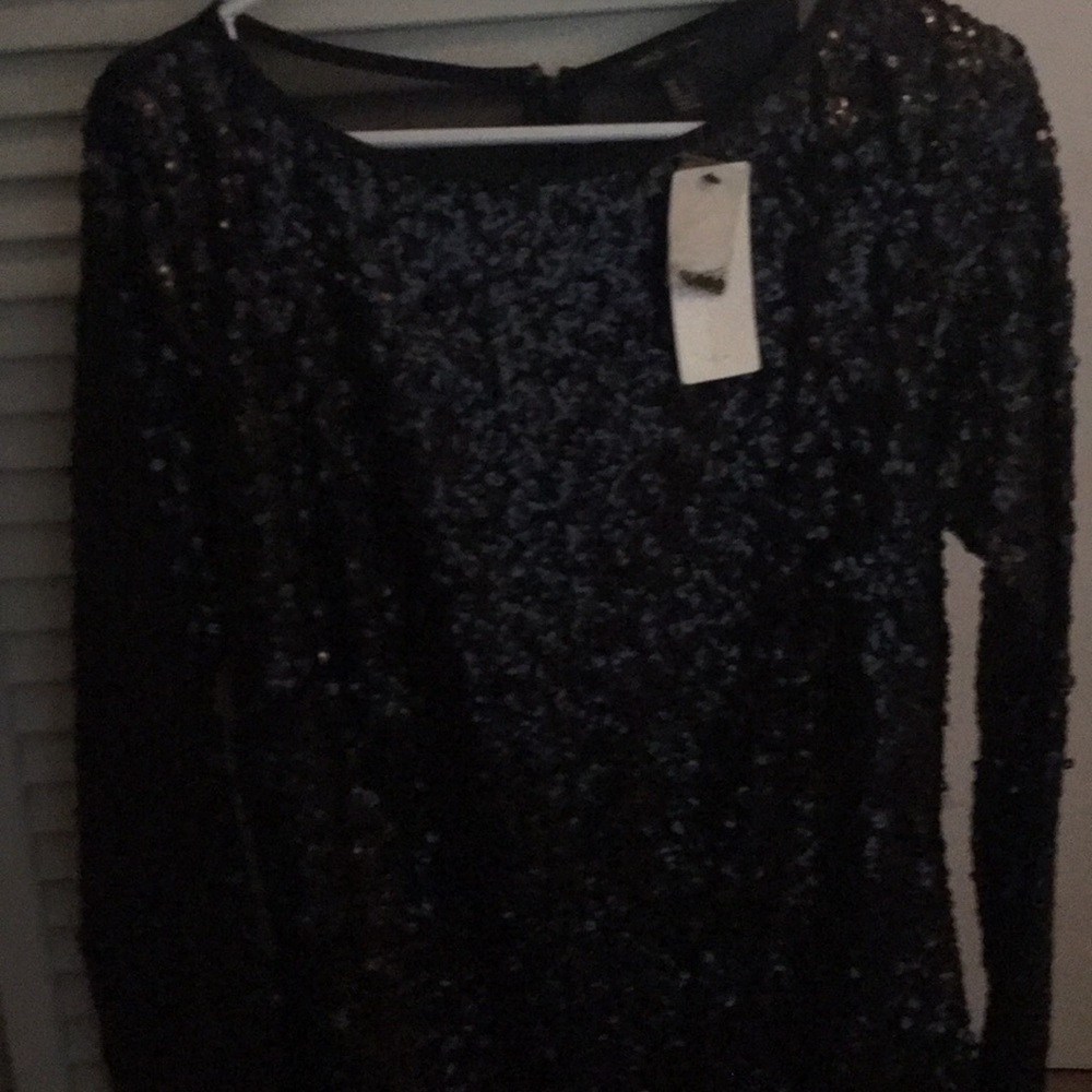 Sequined little black dress